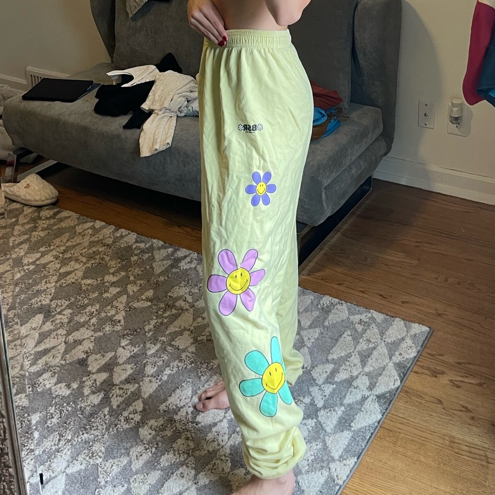 By Samii Ryan yellow smiley sweatpants